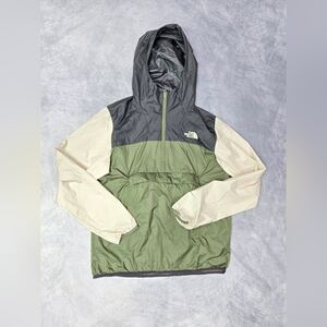 The North Face Fanorak Jacket, a lightweight, packable pullover windbreake